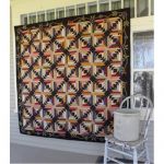 Crisscross Cabin Blooms Lap Quilt Pattern